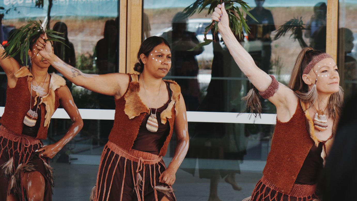 Indigenous women dancing