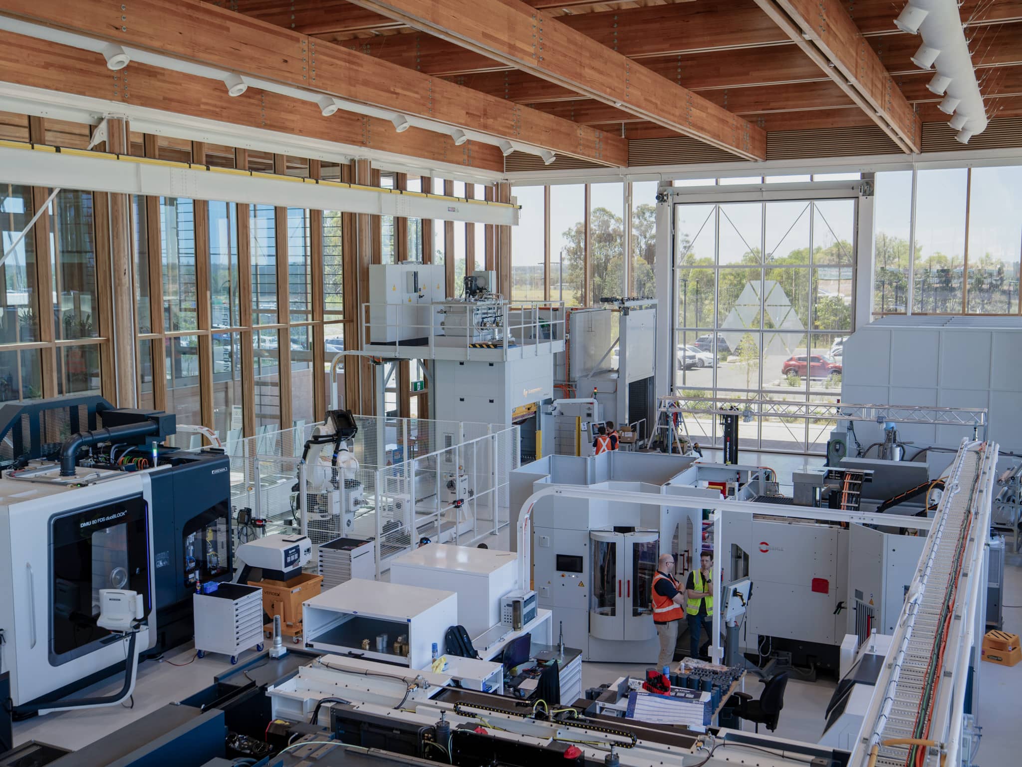 Machines and staff in the AMRF Manufacturing Hall