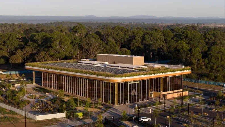 First Building with Blue Mountains in the background