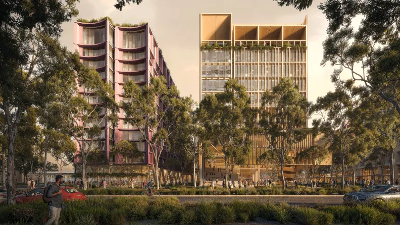 Hotel and commercial buildings with a park and trees