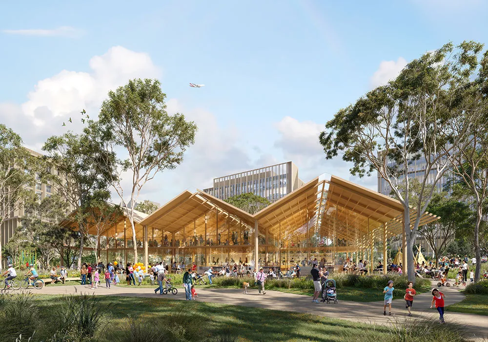 An open air dining venue with a park in the foreground