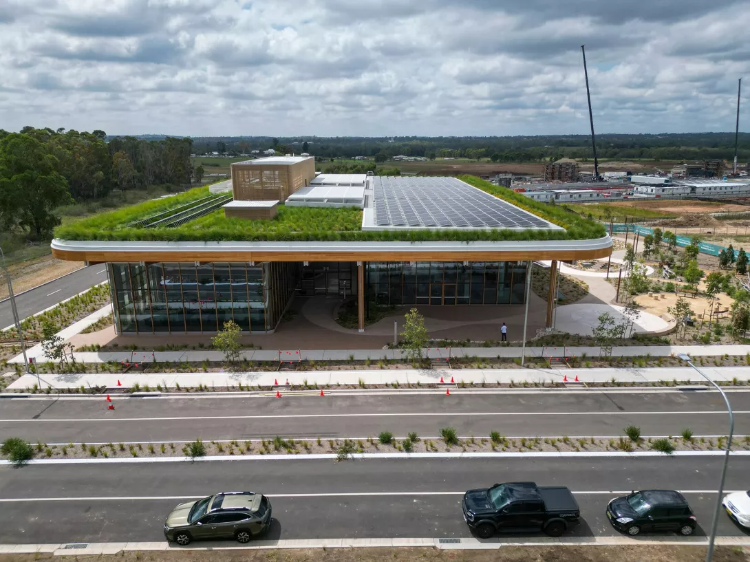 First Building with view of rooftop garden and bio solar